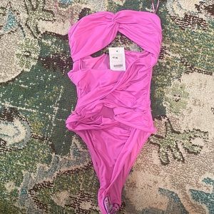 Pink leotard with cut outs